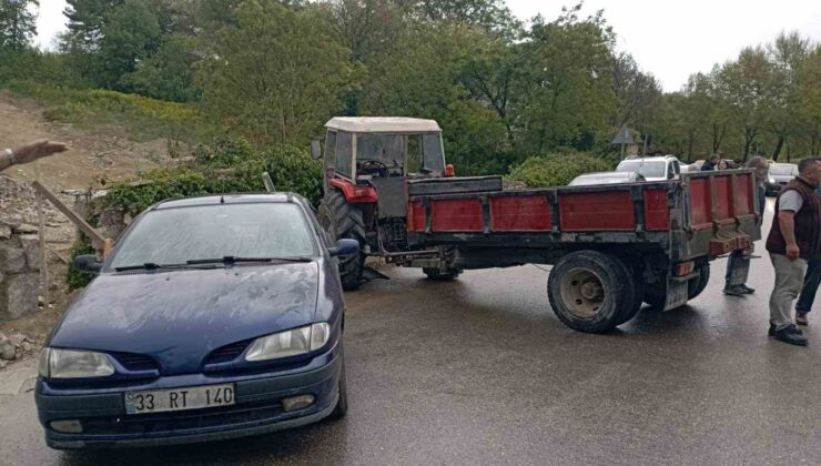 Islak yolda kayan traktör otomobile ardından duvara çarptı