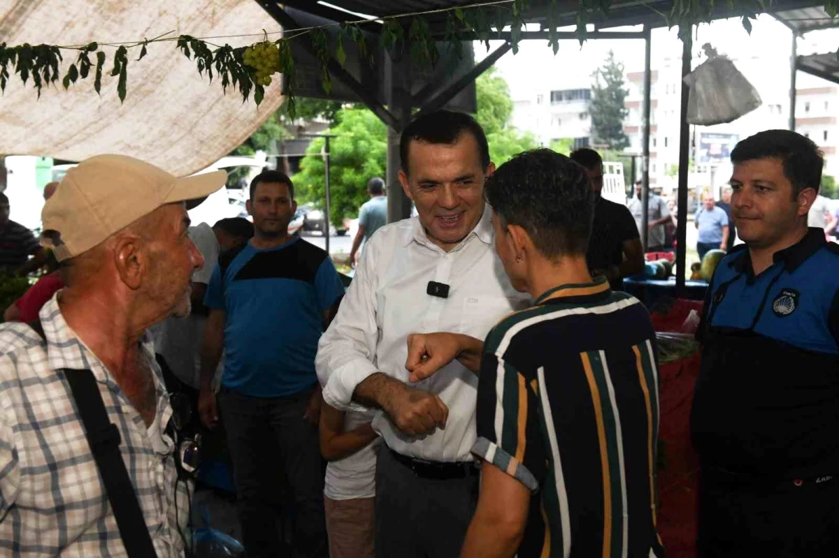 Yenişehir Belediye Başkanı Abdullah Özyiğit, Aydınlıkevler Mahallesi’ndeki Semt Pazarını Ziyaret Etti